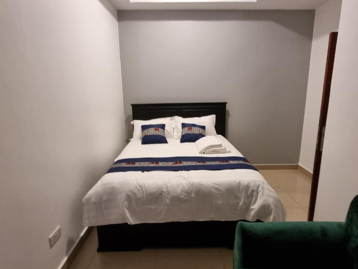 Eika Suites At Acacia Кампала Екстериор снимка