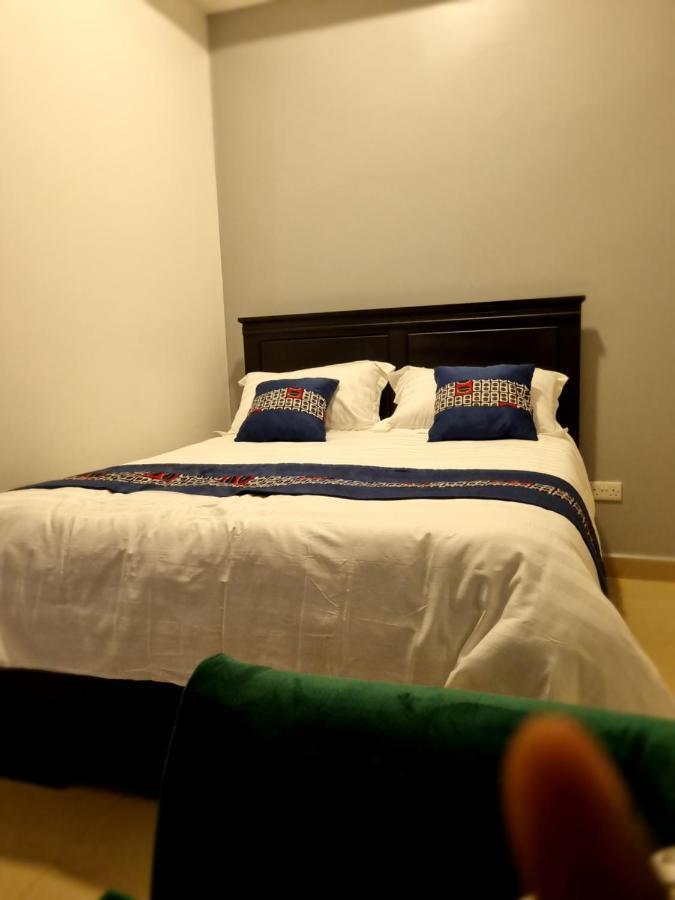 Eika Suites At Acacia Кампала Екстериор снимка