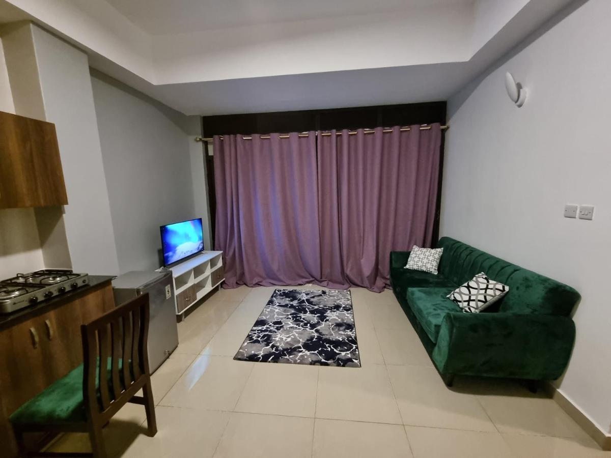 Eika Suites At Acacia Кампала Екстериор снимка